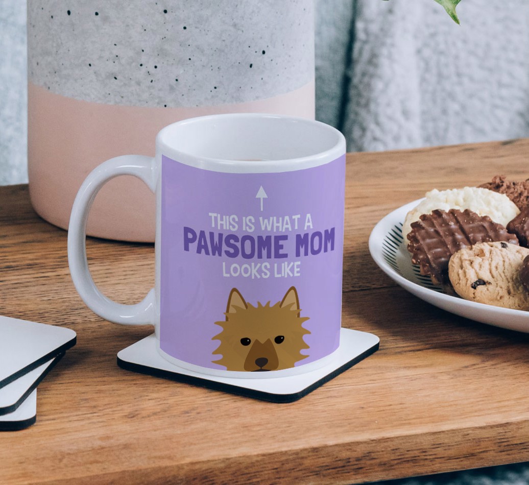 Pawsome Dog Mom: Personalized {breedFullName} Mug - on a coffee table