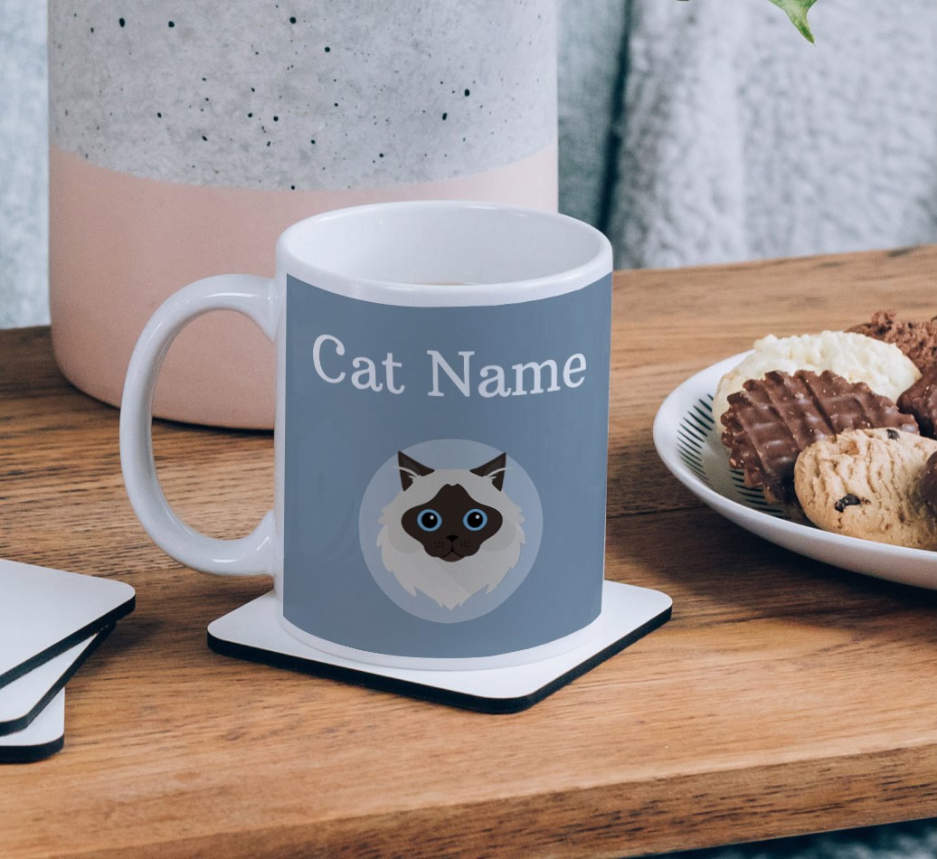 Name & Icon: Personalized {breedCommonName} Mug - on a coffee table
