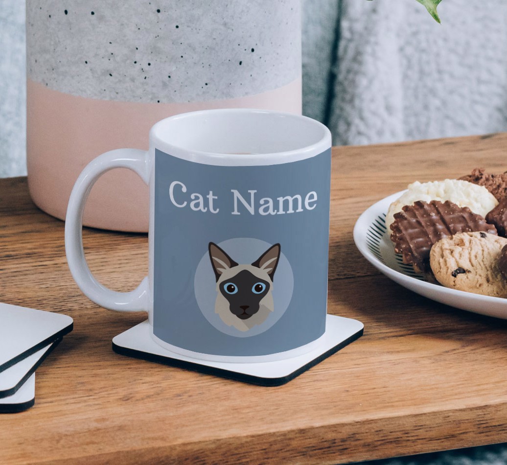 Name & Icon: Personalised {breedCommonName} Mug  - on a coffee table