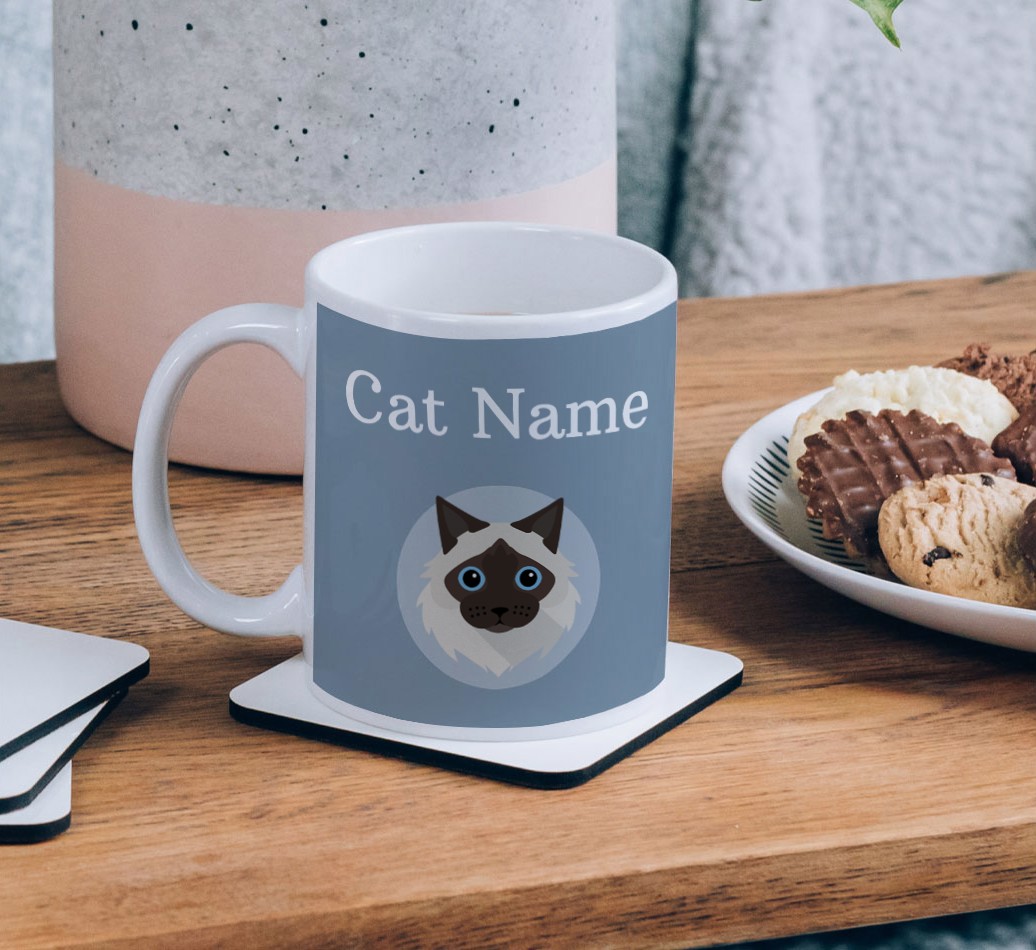 Name & Icon: Personalized {breedCommonName} Mug - on a coffee table