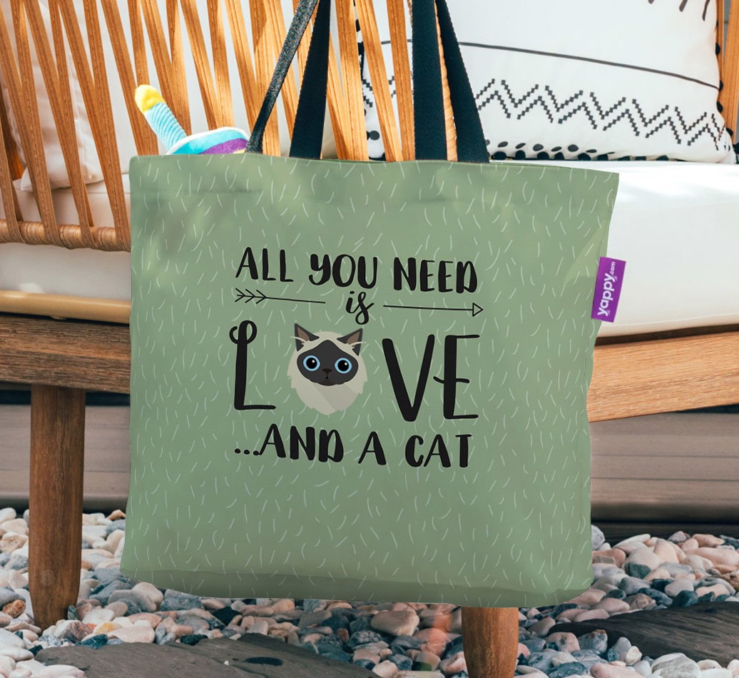 All You Need Is Love: Personalised Canvas Bag with {breedFullName} Icon - hanging on a chair