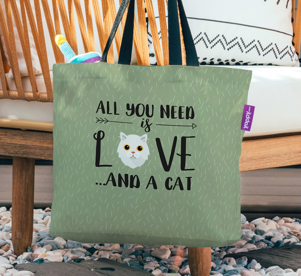 All You Need Is Love: Personalised Canvas Bag with {breedFullName} Icon - hanging on a chair