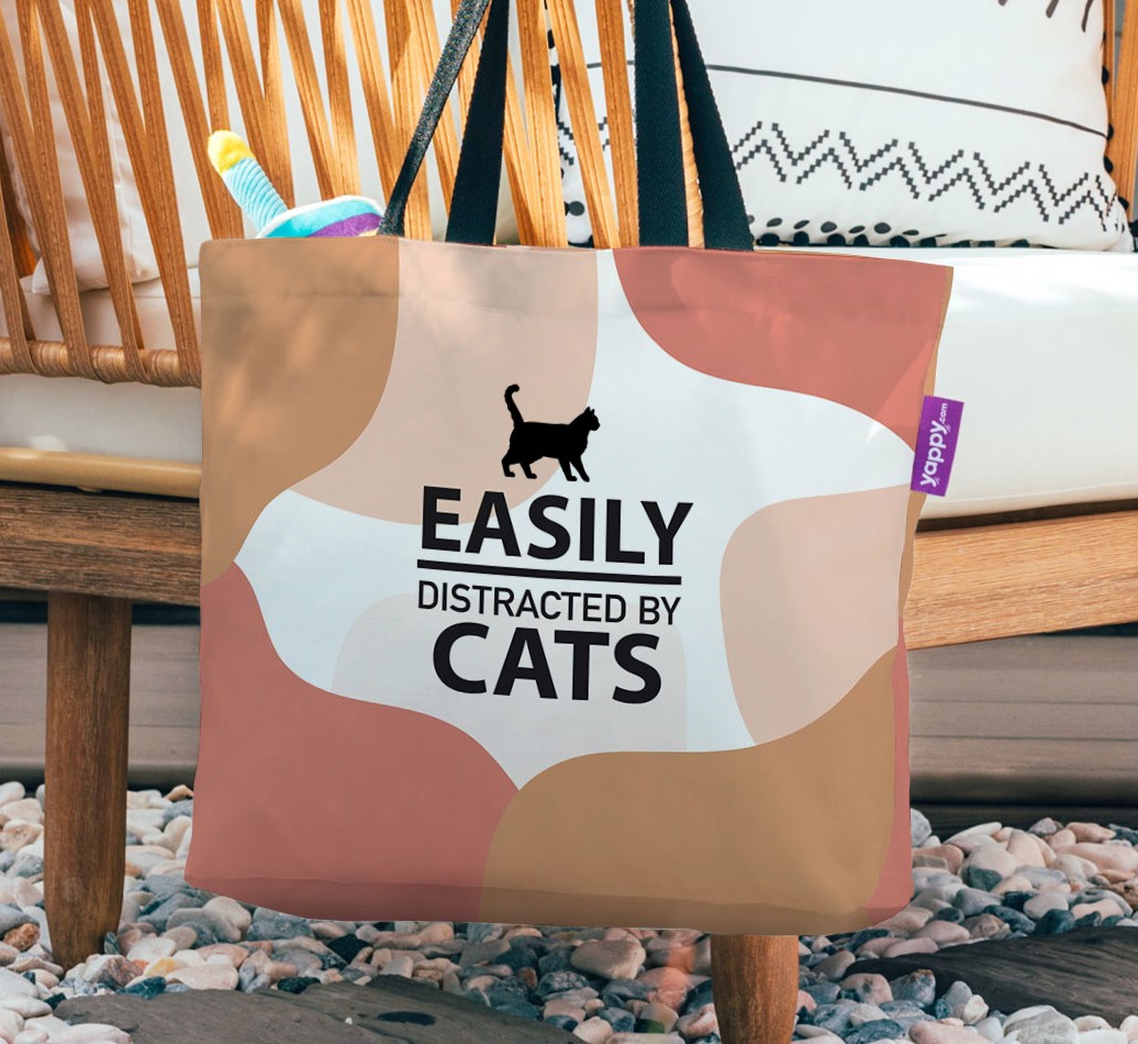 Easily Distracted By Cats: Personalized {breedFullName} Canvas Bag - hanging on a chair