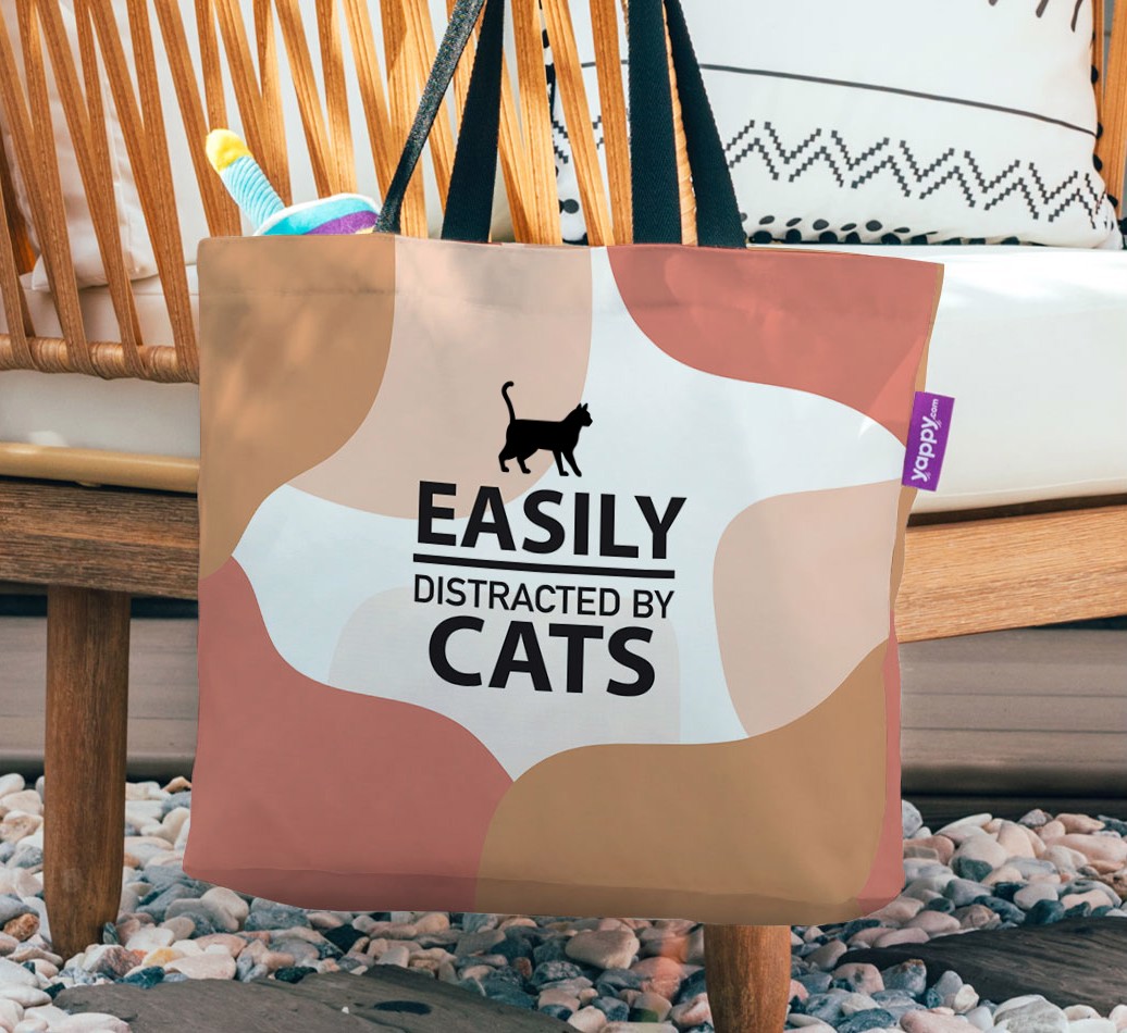 Easily Distracted By Cats: Personalized {breedFullName} Canvas Bag - hanging on a chair