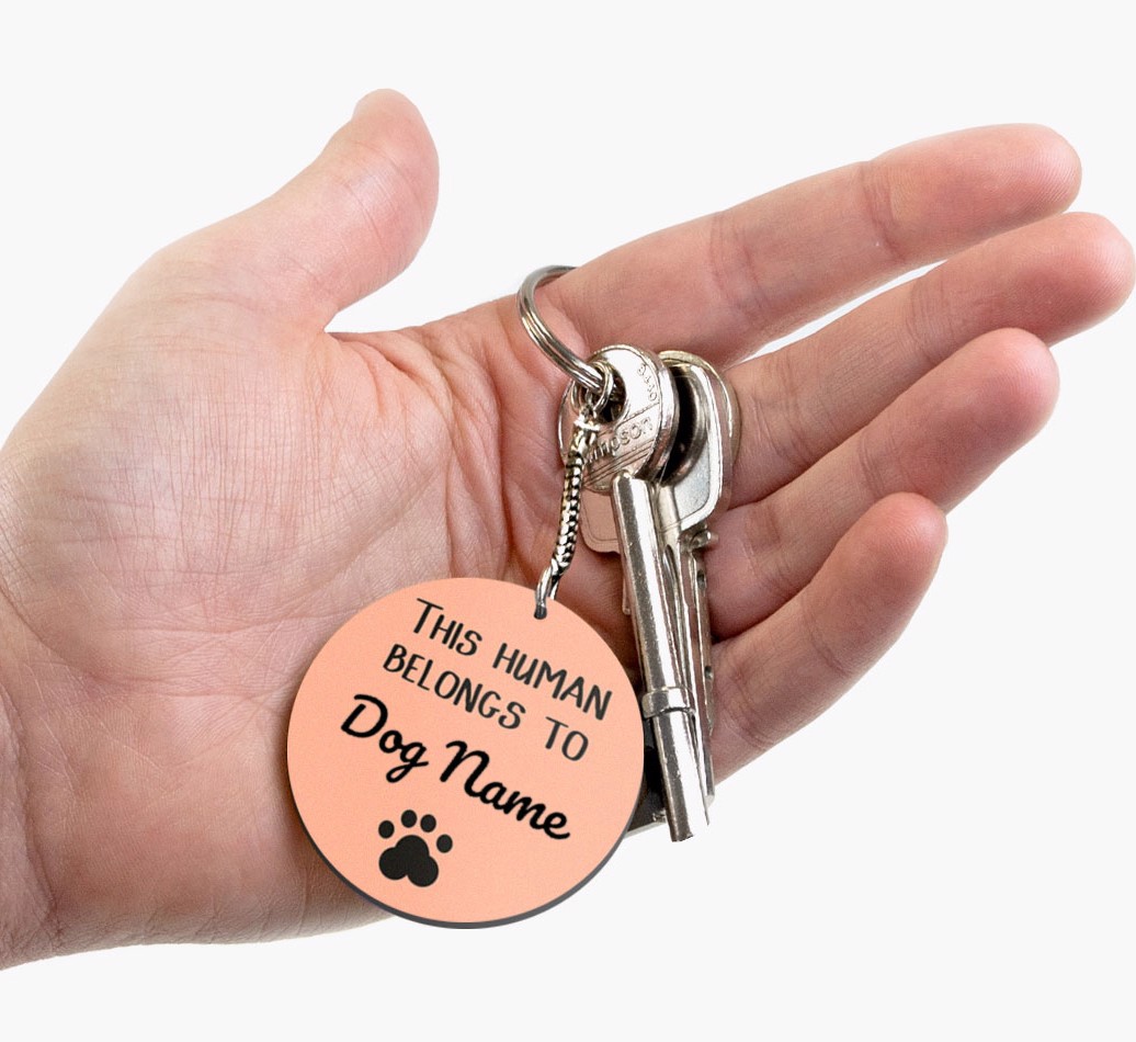 'Personalized {breedFullName} 'This human belongs to...' Double-sided Keyring Front on hand