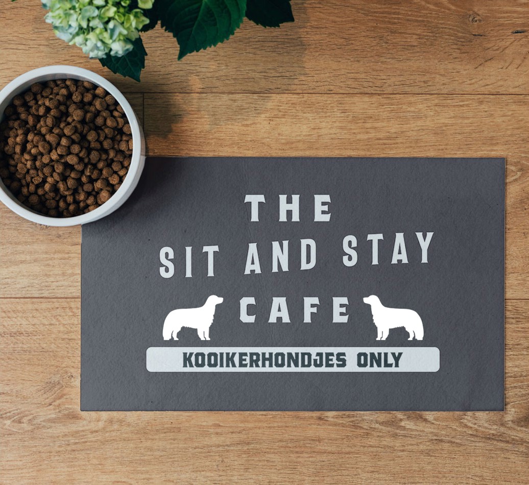 'Sit and Stay Cafe' Feeding Mat - flatlay on wooden floor with bowl