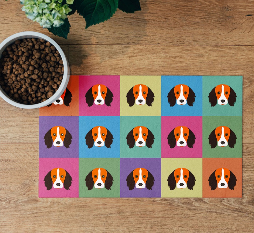 'Icon Pattern' Feeding Mat - flatlay on wooden floor with bowl