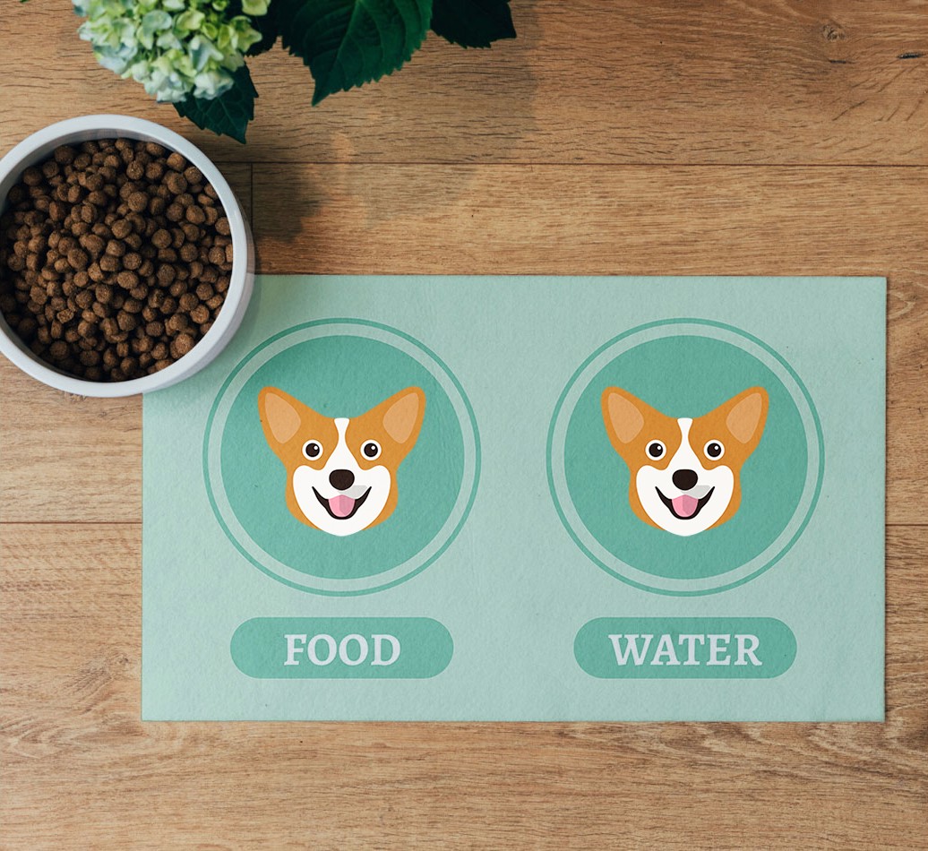 'Yappicons' Feeding Mat - flatlay on wooden floor with bowl