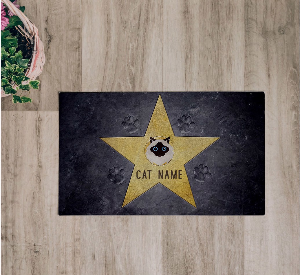 'Star of Fame' Feeding Mat - flatlay on wooden floor with bowl