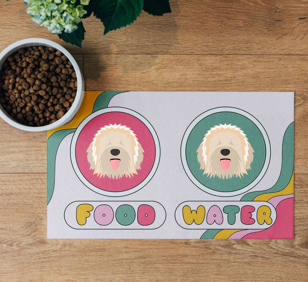 Rainbow Icons: Personalised {breedFullName} Feeding Mat - flatlay on wooden floor with bowl