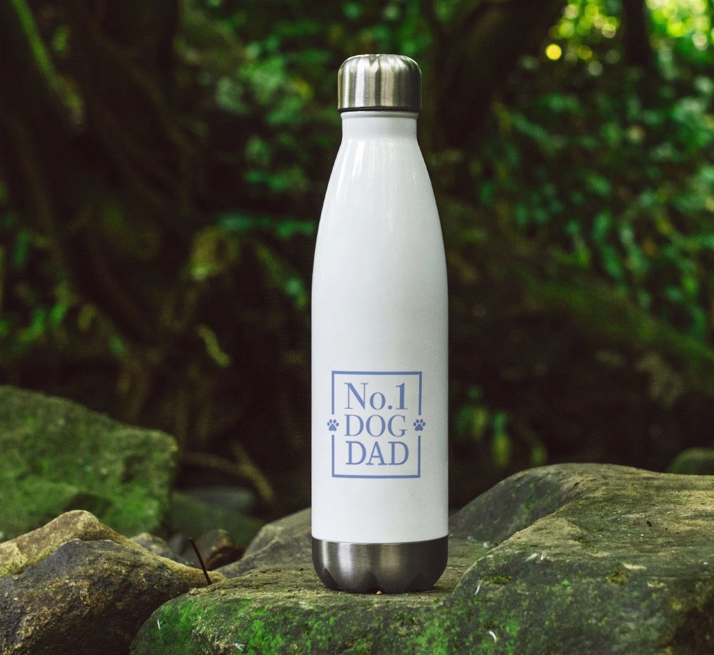 'No.1 Dog Dad' - Personalized {breedFullName} Water Bottle - full image on rocks