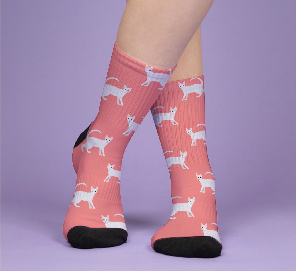 Your Cat Icon Pattern: Personalised {breedFullName} Socks - woman's feet on purple background