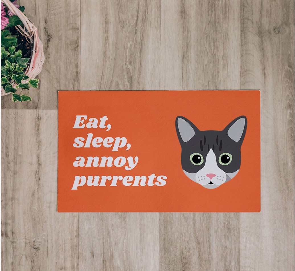 Eat, Sleep, Annoy Purrents: Personalised {breedCommonName} Feeding Mat - flatlay on wooden floor