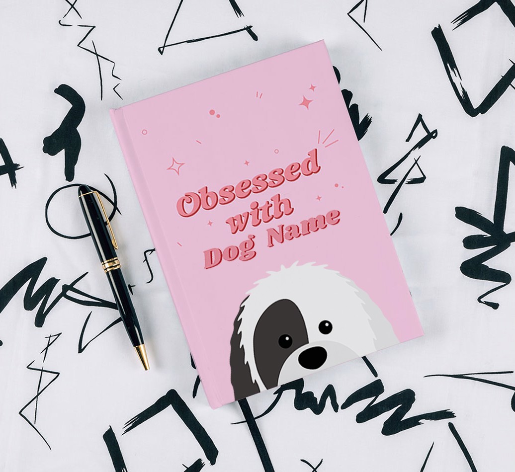 Obsessed With: Personalised {breedFullName} Notebook - with pen on black & white pattern background