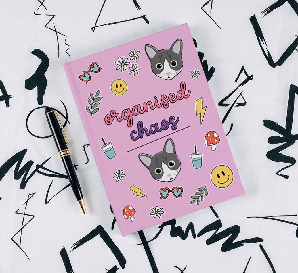 Organised Chaos: Personalised {breedCommonName} Notebook - with pen on black & white pattern background