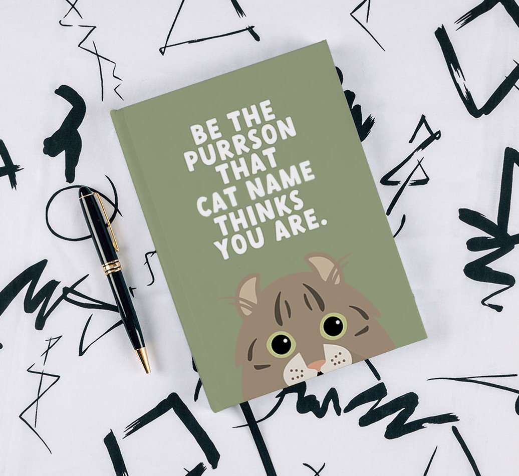 Be The Purrson: Personalised {breedCommonName} Notebook - with pen on black & white pattern background
