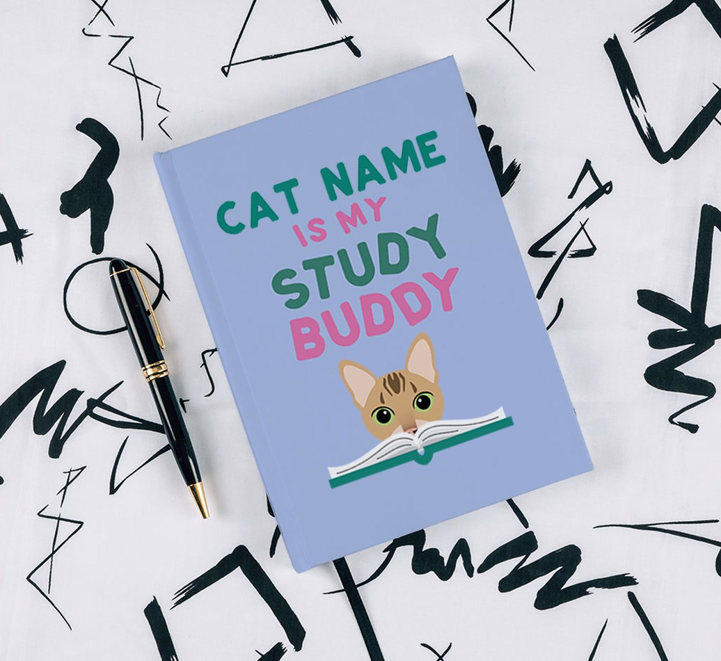 Study Buddy: Personalised {breedCommonName} Notebook - with pen on black & white pattern background