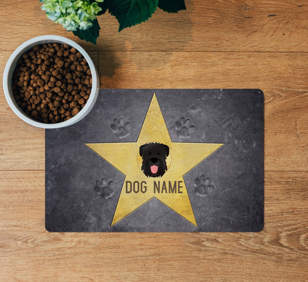 Star of Fame: Personalized {breedFullName} Feeding Mat - layed flat on wooden floor with bowl