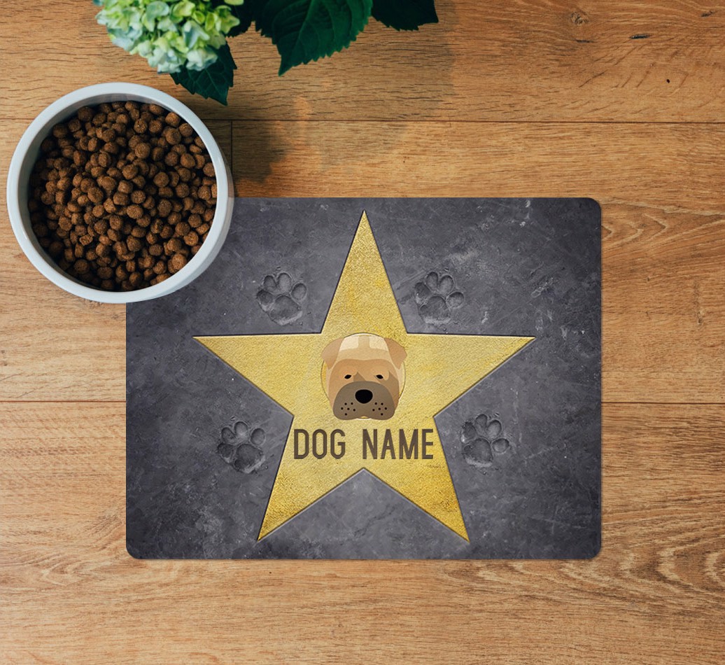 Star of Fame: Personalised {breedFullName} Feeding Mat - layed flat on wooden floor with bowl