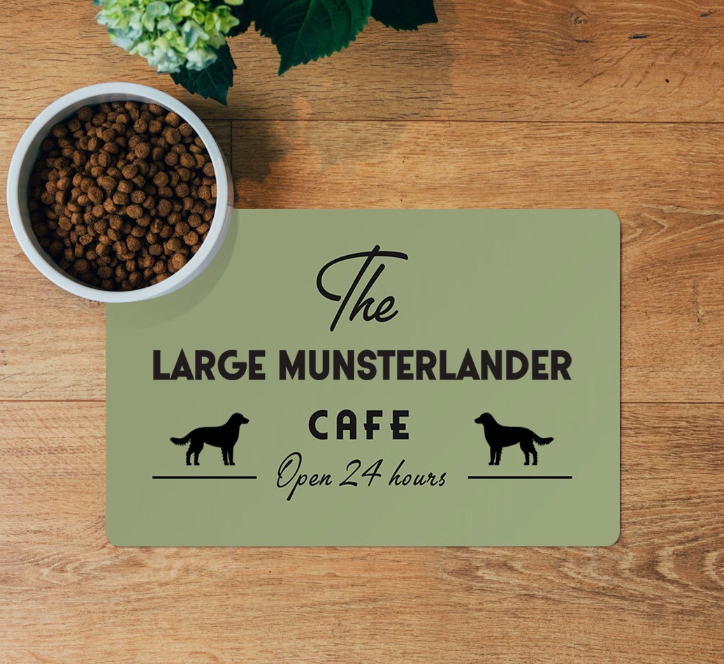 The {breedFullName} Cafe: Personalized Placemat - layed flat on wooden floor with bowl