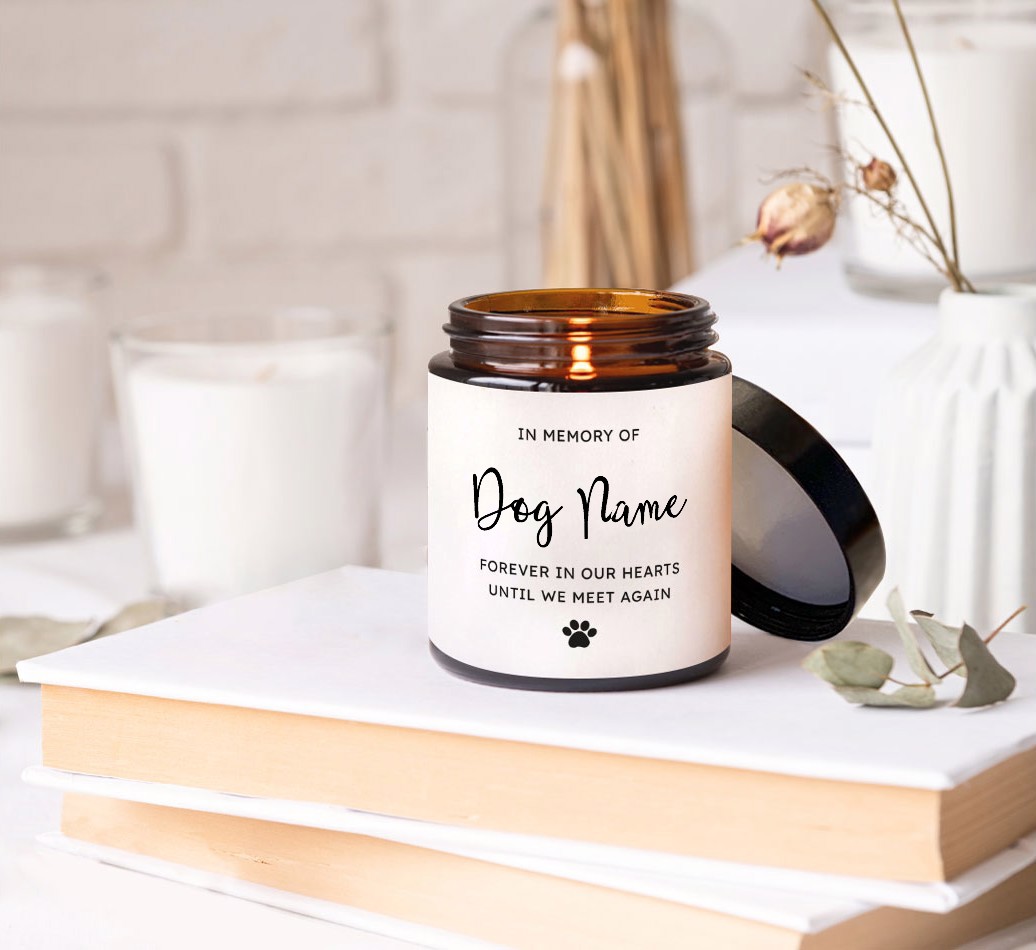 In Memory: Personalised Candle - on books on a bedside table