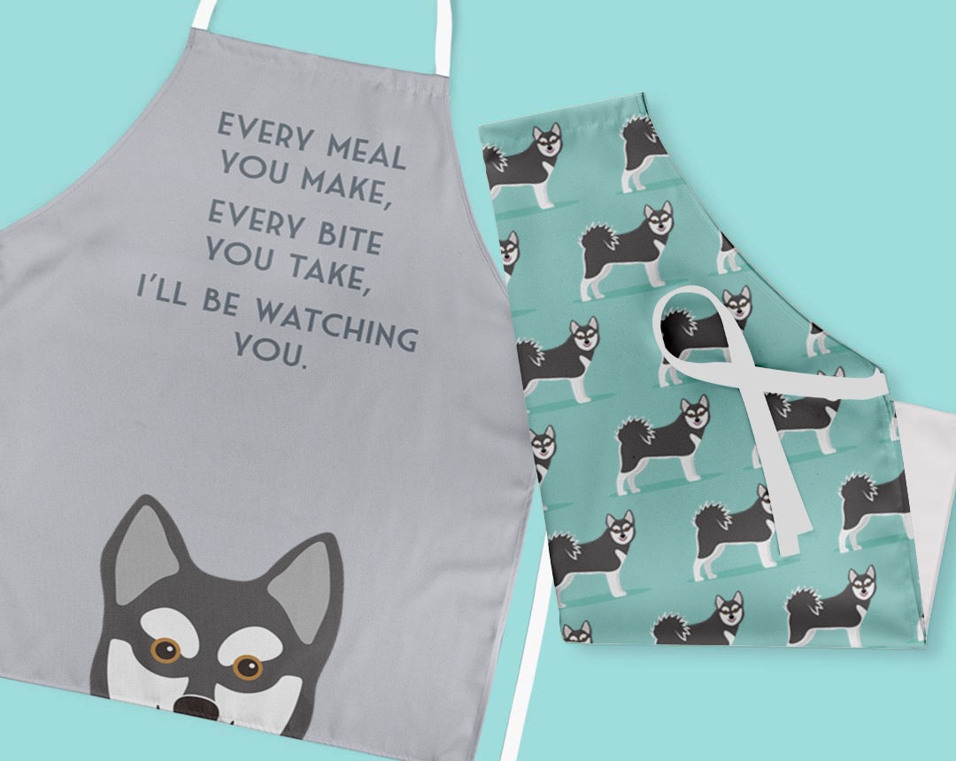 Two personalised aprons featuring personalised dog designs