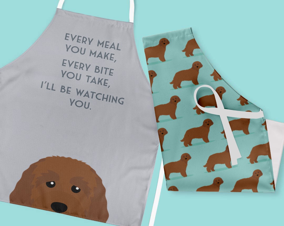 Two personalised aprons featuring personalised dog designs