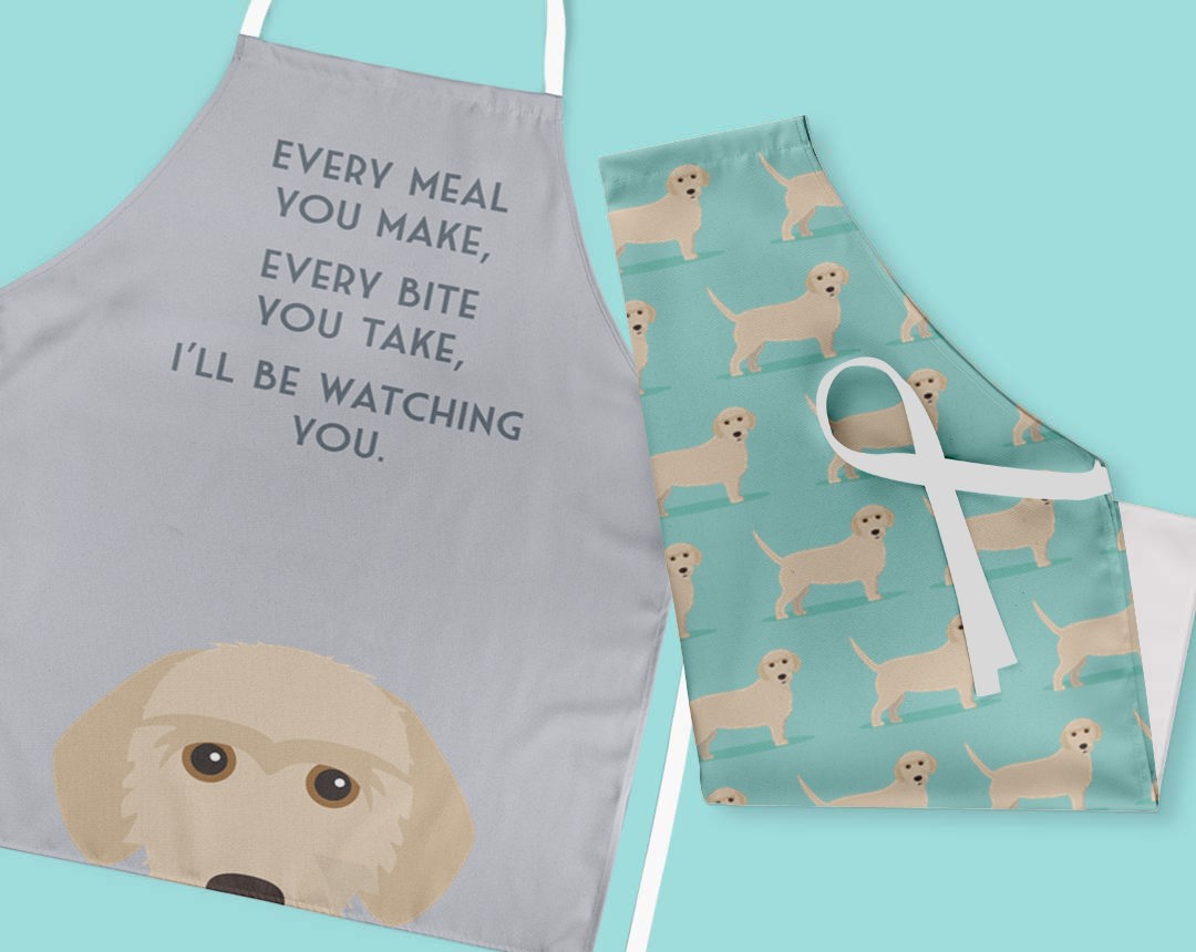 Two personalised aprons featuring personalised dog designs