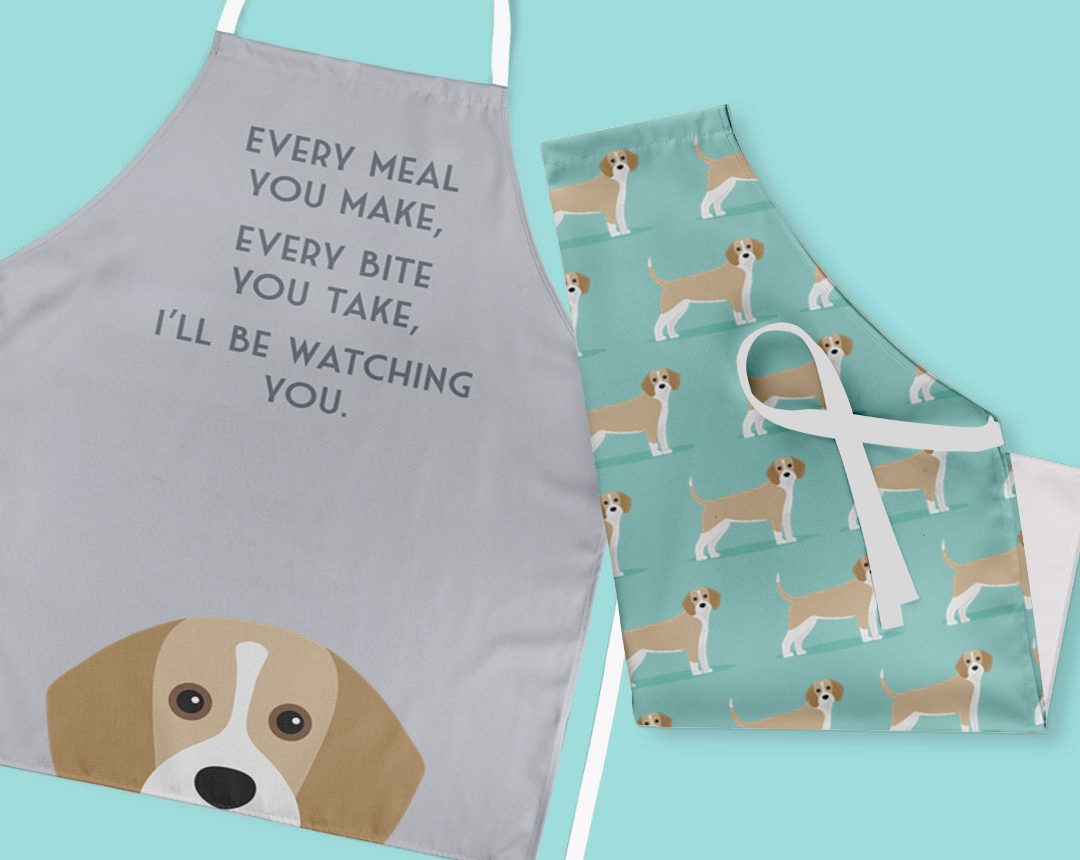 Two personalised aprons featuring personalised dog designs