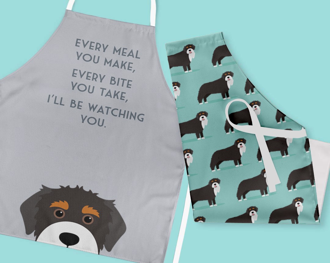 Two personalised aprons featuring personalised dog designs