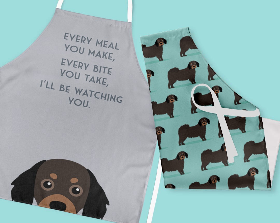 Two personalised aprons featuring personalised dog designs