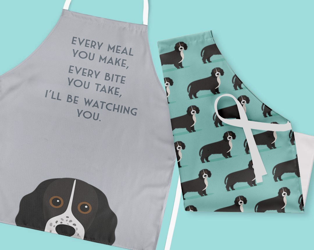 Two personalised aprons featuring personalised dog designs