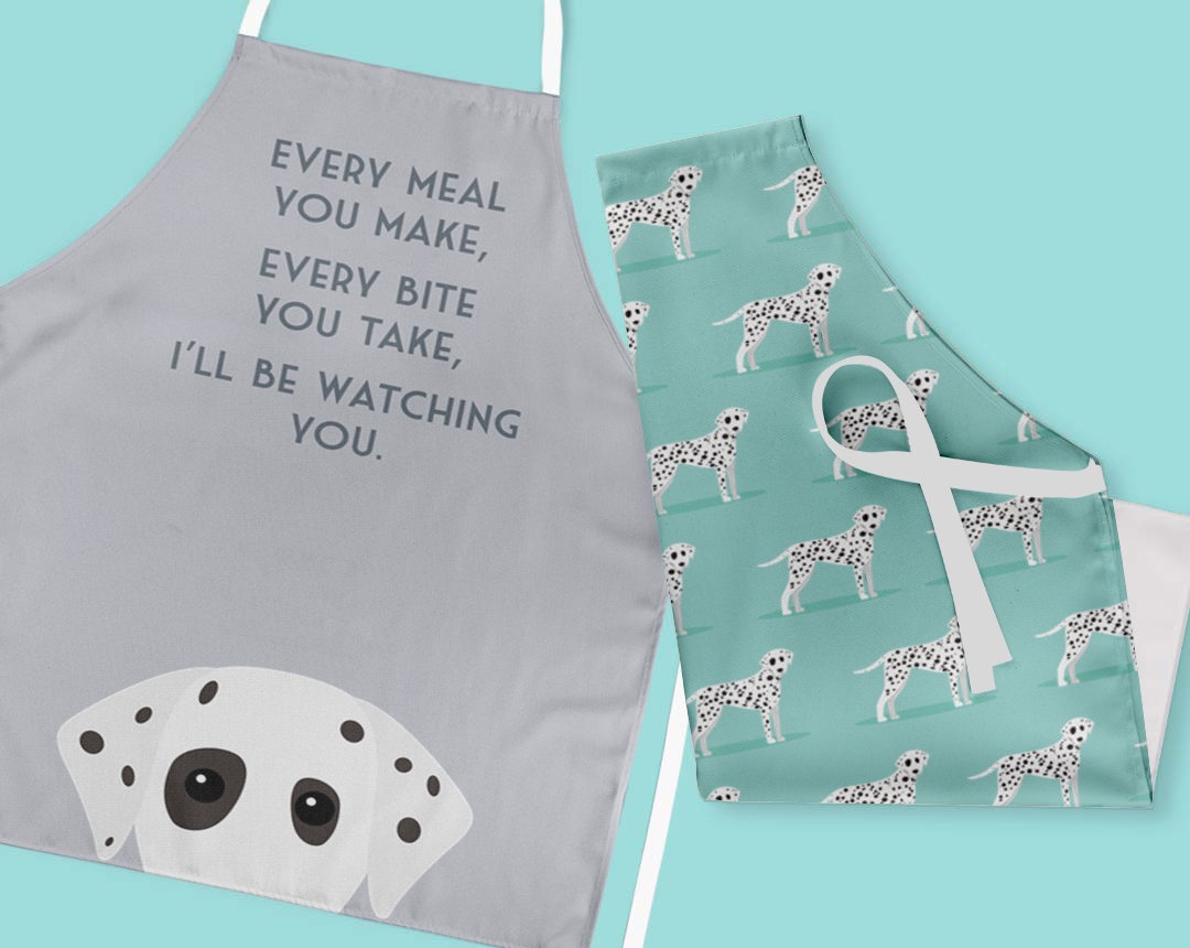 Two personalised aprons featuring personalised dog designs