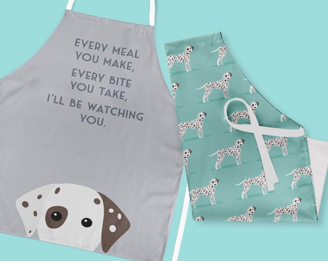 Two personalised aprons featuring personalised dog designs