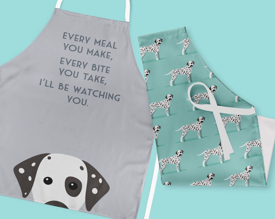 Two personalised aprons featuring personalised dog designs