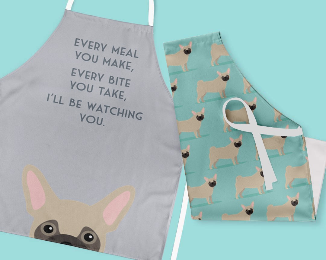 Two personalised aprons featuring personalised dog designs