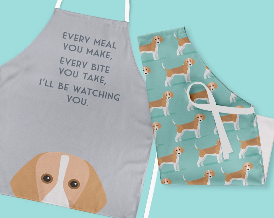 Two personalised aprons featuring personalised dog designs