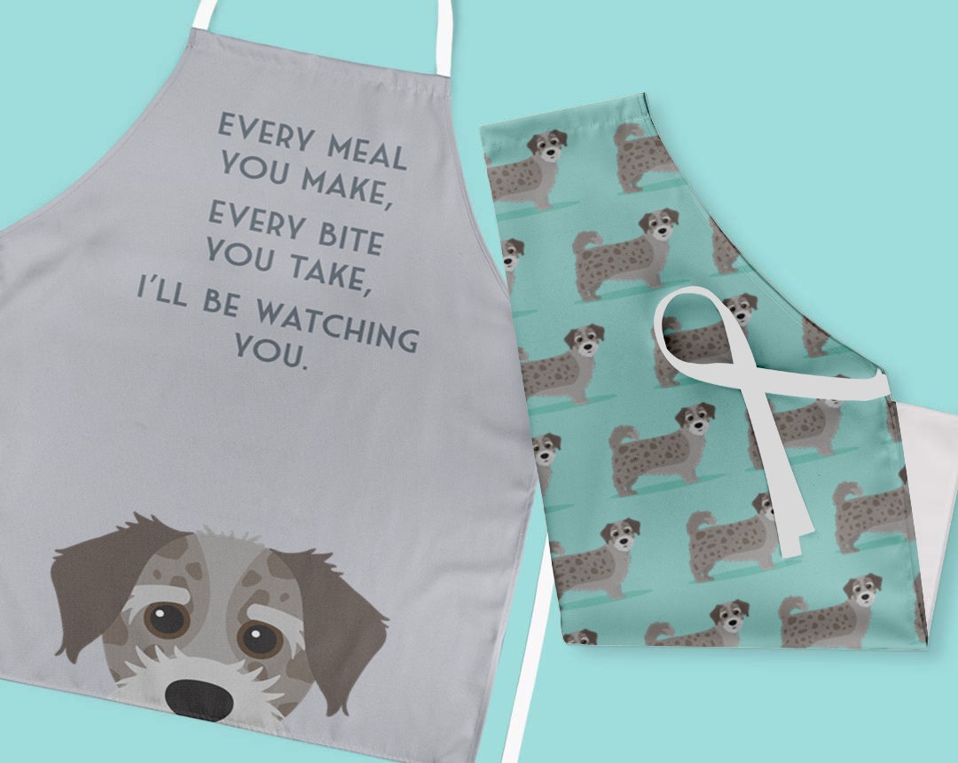 Two personalised aprons featuring personalised dog designs