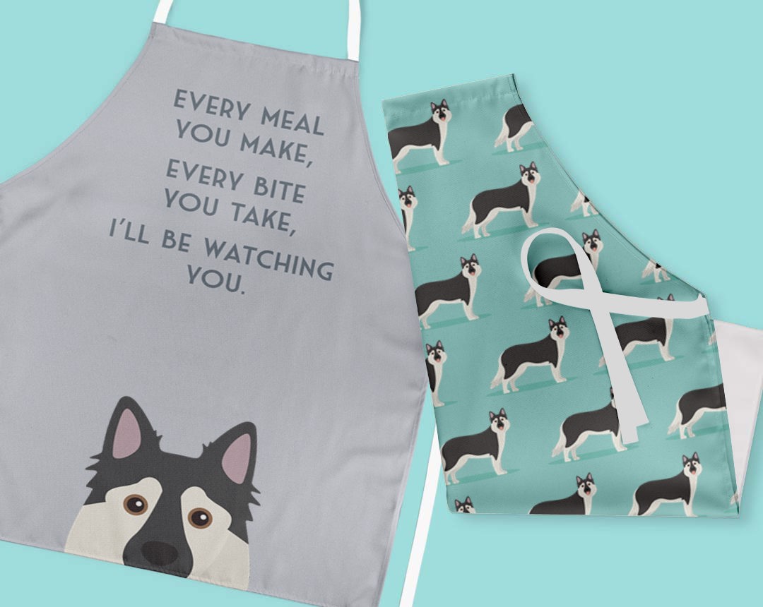 Two personalised aprons featuring personalised dog designs