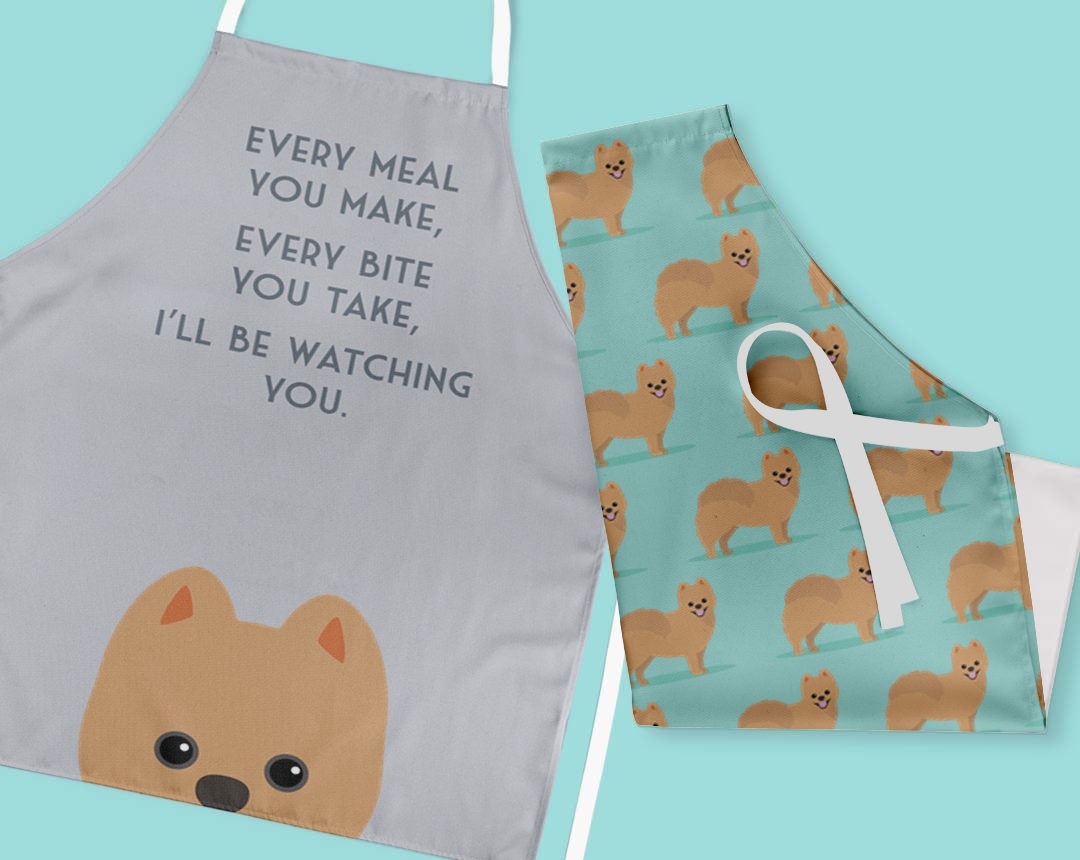 Two personalised aprons featuring personalised dog designs