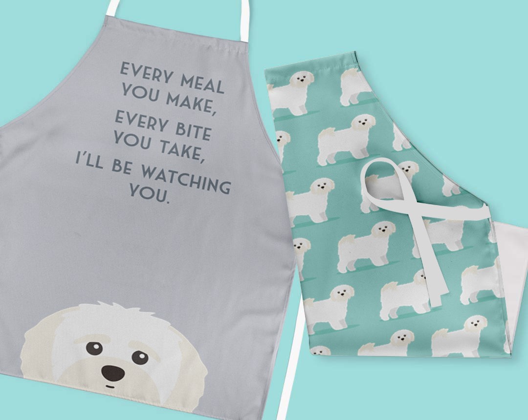 Two personalised aprons featuring personalised dog designs