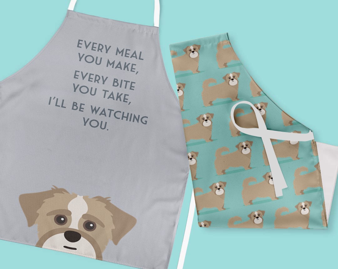 Two personalised aprons featuring personalised dog designs