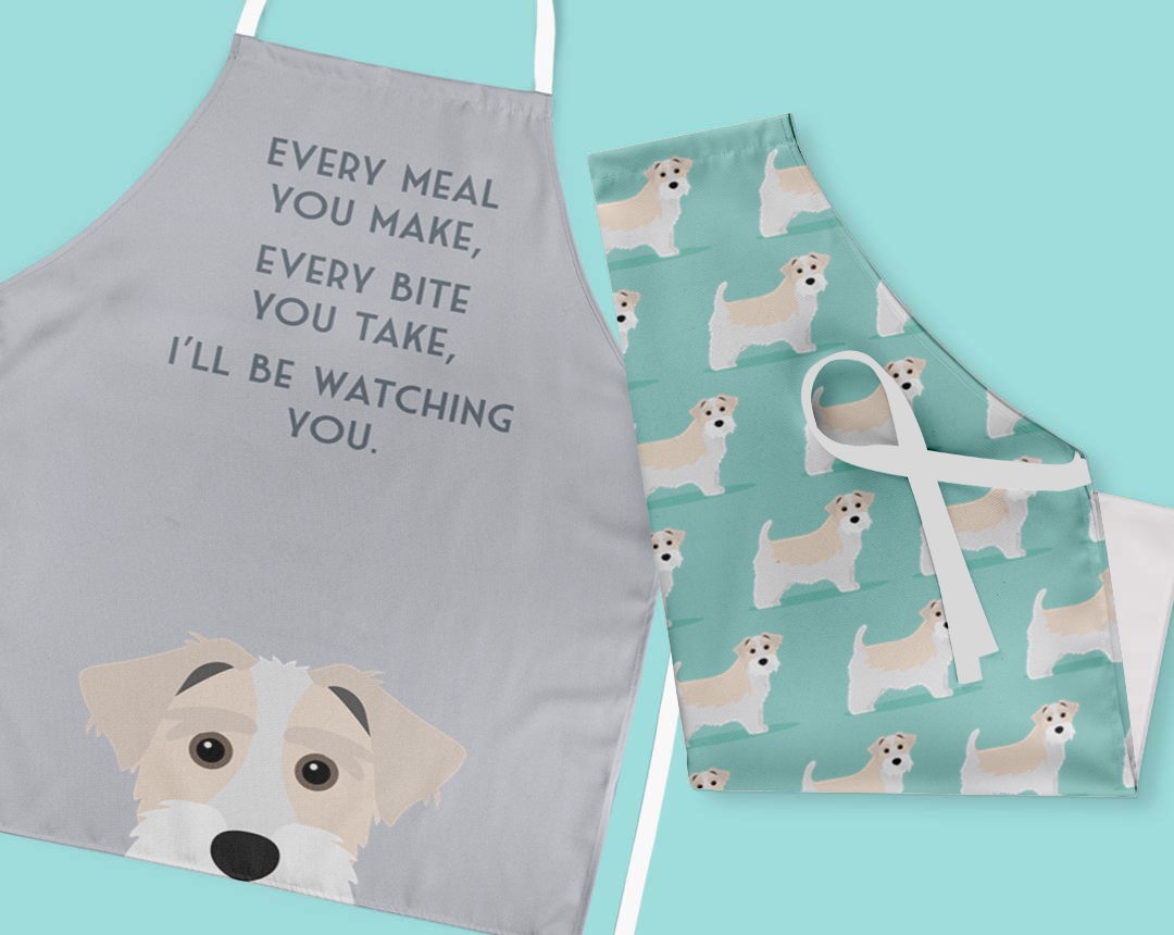 Two personalised aprons featuring personalised dog designs