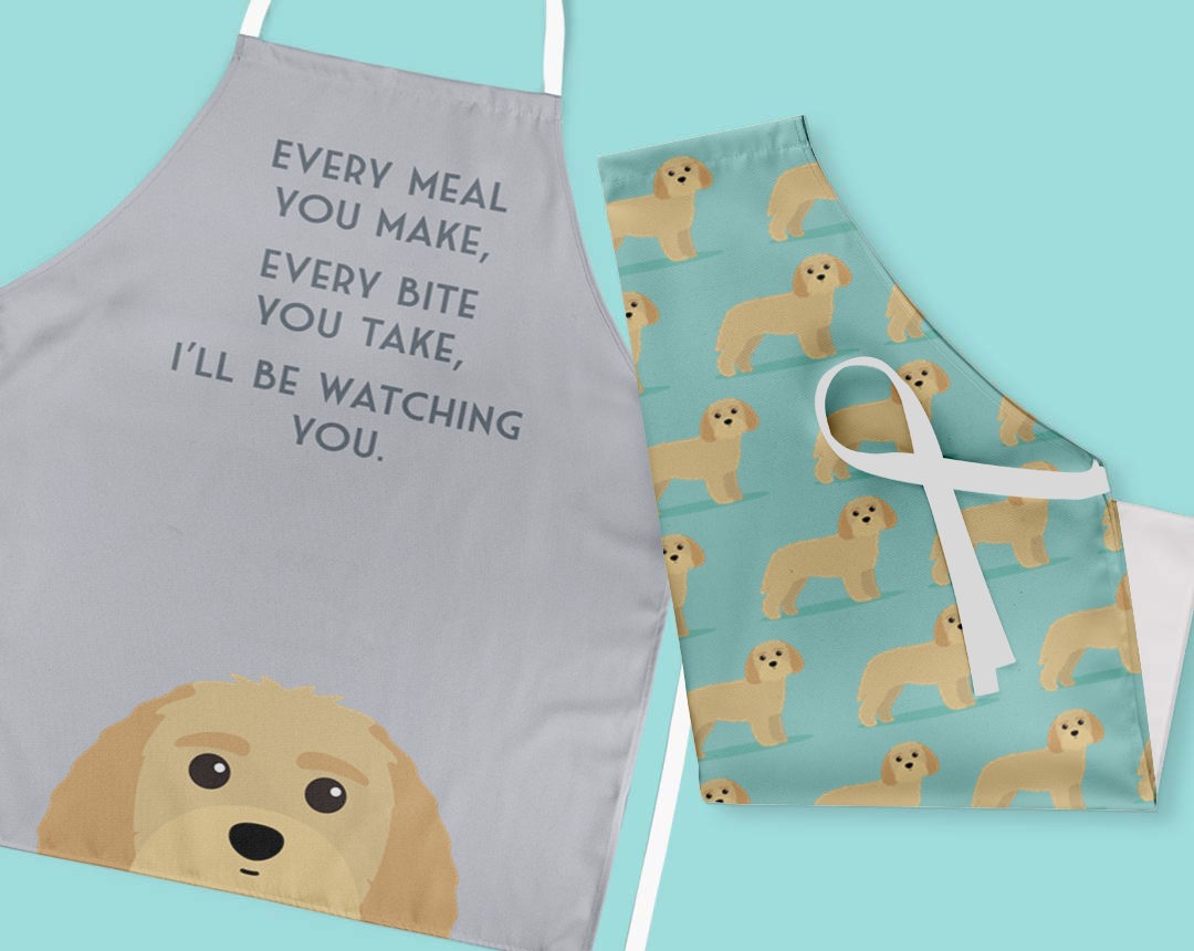 Two personalised aprons featuring personalised dog designs